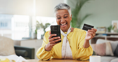 Buy stock photo Happy woman, smartphone and credit card in home with online shopping, goals or easy payment on web. Mature person, phone and winning with success, sale and fintech for e commerce with app in house