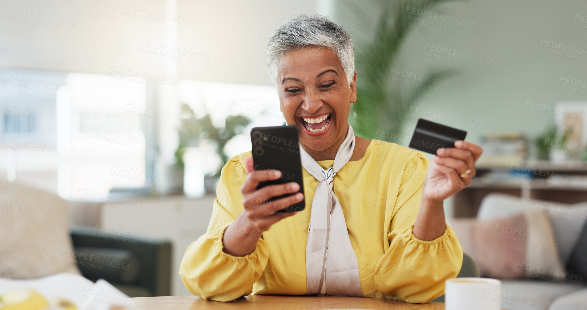 Buy stock photo Happy woman, smartphone and credit card in home with online shopping, goals or easy payment on web. Mature person, phone and winning with success, sale and fintech for e commerce with app in house