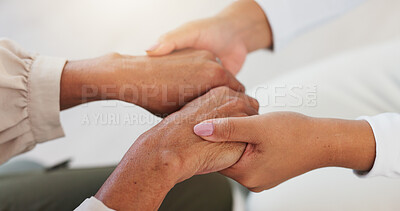 Buy stock photo Comfort, holding hands and trust with people at table in home together for bonding, care or love. Consoling, empathy or support and friends in apartment for help with anxiety or depression from above