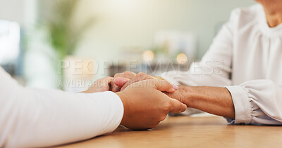 Buy stock photo Comfort, holding hands and support with people at table in home together for bonding, care or love. Consoling, empathy or trust and friends in apartment for help with anxiety, depression or grief