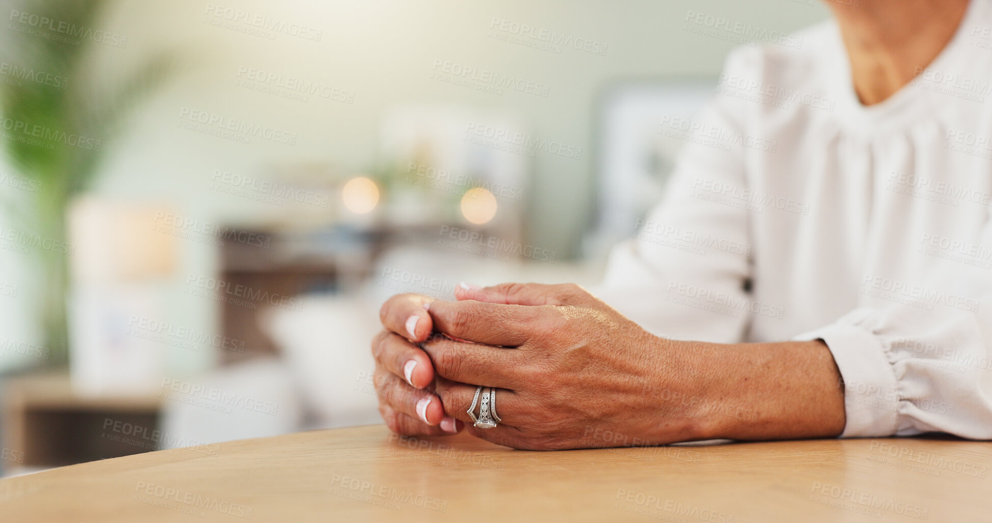 Buy stock photo Hands, relax and waiting with woman in living room of home for contemplation, memory or nostalgia. Reflection, resting and thinking with senior person at table in apartment for planning or retirement