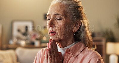 Buy stock photo Belief, hope and prayer with senior woman on sofa in living room of home for trust in Christ Jesus. Faith, religion and worship with old person praying to God for confession, forgiveness or guidance