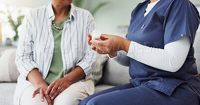 Buy stock photo Nurse, hands or senior with medication for instructions, symptoms or side effects in home. Caregiver, pills and consulting with elderly patient for prescription, healthcare or remedy on sofa in house