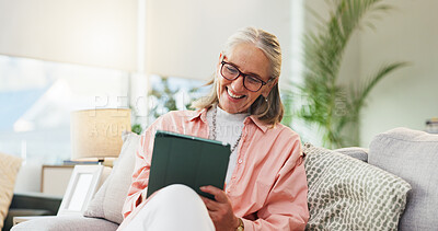 Buy stock photo Relax, smile and tablet with old woman on sofa in living room of home for break or ebook reading. App, literature and story with senior person in apartment for hobby, novel or retirement wellness