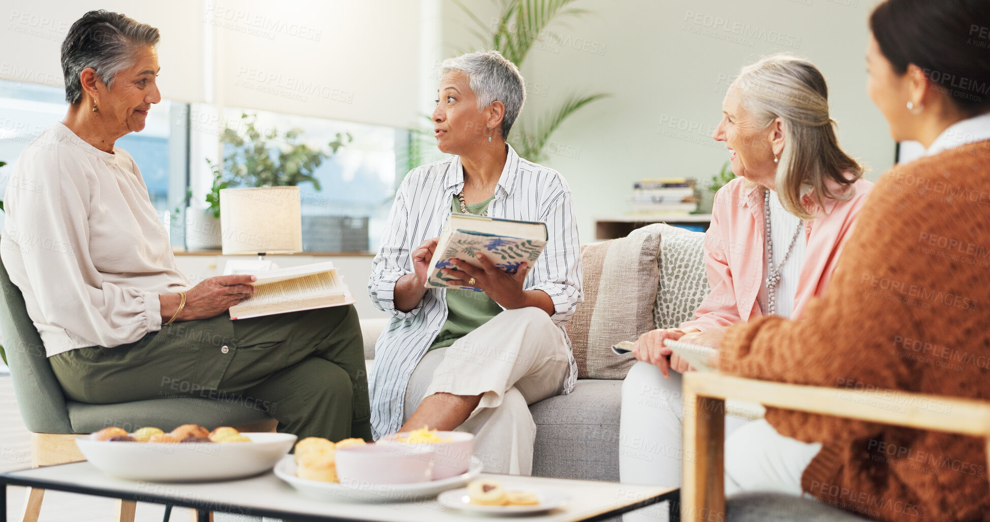 Buy stock photo Book club, friends and senior women in home, retirement and review of novel, discussion and bonding. Talking, reader and elderly people with hobby in lounge, snacks and criticism of story in house