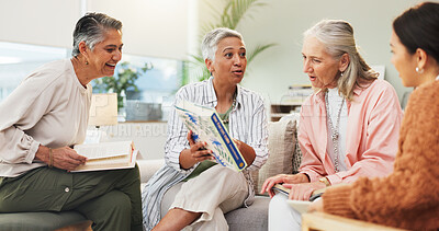 Buy stock photo Senior women, meeting or discussion in home with book club, novel or talking for community. Happy, elderly friends or conversation in lounge with speaking, literature or gathering for chapter review.