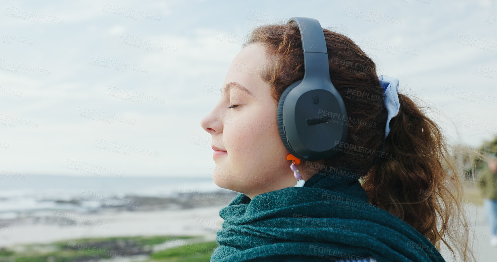 Buy stock photo Breathing, tourist and woman with headphones, beach or mindfulness on vacation, streaming and music. Outdoor, space and person with tech for sound, calm and listening to radio on summer holiday