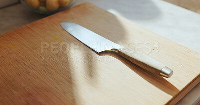Buy stock photo Knife, cutting board and empty kitchen at house for cooking, meal preparation and culinary workspace. Utensils, setup and chopping equipment for safety, catering accessories and interior and cuisine