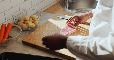Buy stock photo Hands, chef and steak on chopping board at restaurant, kitchen and meal prep with cuisine for career. Person, cooking meat and culinary skills for catering services, food and ingredients at diner