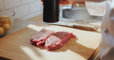 Buy stock photo Cooking, hands or chef with steak seasoning for meal preparation, culinary skill or enhance flavor. Restaurant, person and spices on beef protein in kitchen for meat recipe, fine dining and nutrition