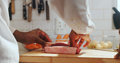 Buy stock photo Hands, chef and season meat on cutting board at restaurant, kitchen and cuisine for career. Person, cooking and culinary skills with spices for catering services, gourmet food or ingredients at diner