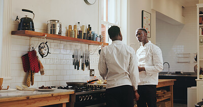 Buy stock photo Cooking, conversation and instructions with black men in kitchen of home for culinary course. Food, learning and study with chef talking to student in apartment for lesson or skills development