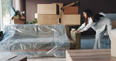 Buy stock photo Woman, new home and moving sofa for interior design, relocation and boxes with real estate investment. Person, couch and cardboard package in lounge with property, mortgage and furniture at apartment