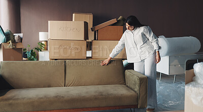 Buy stock photo Furniture, packing and moving with woman and sofa of new home for property investment, renovation and future. Relocation, furniture and real estate rental with person in living room of apartment