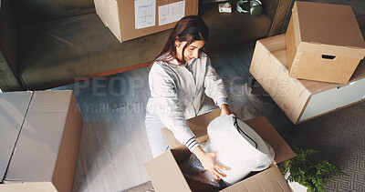 Buy stock photo Woman, boxes and lamp for moving to new home with real estate investing, mortgage and fresh start. Person, cardboard package and relocation with unboxing, above and property purchase at apartment