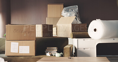 Buy stock photo Empty, room and boxes for move, apartment and property investment of home, real estate and mortgage. New house, furniture and lounge with cardboard for relocation, accommodation and organized package
