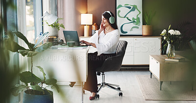 Buy stock photo Business, typing and woman in home with headphones, streaming and copywriting in remote work. Smile, digital and freelancer in house with tech, writing project and online radio in WFH setup.