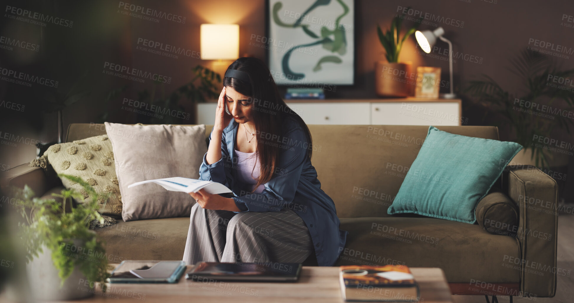 Buy stock photo Budget, woman and headache with paperwork on sofa for mortgage debt, home bills or inflation stress. Finance planning, person and worry with documents in living room for expenses and asset management