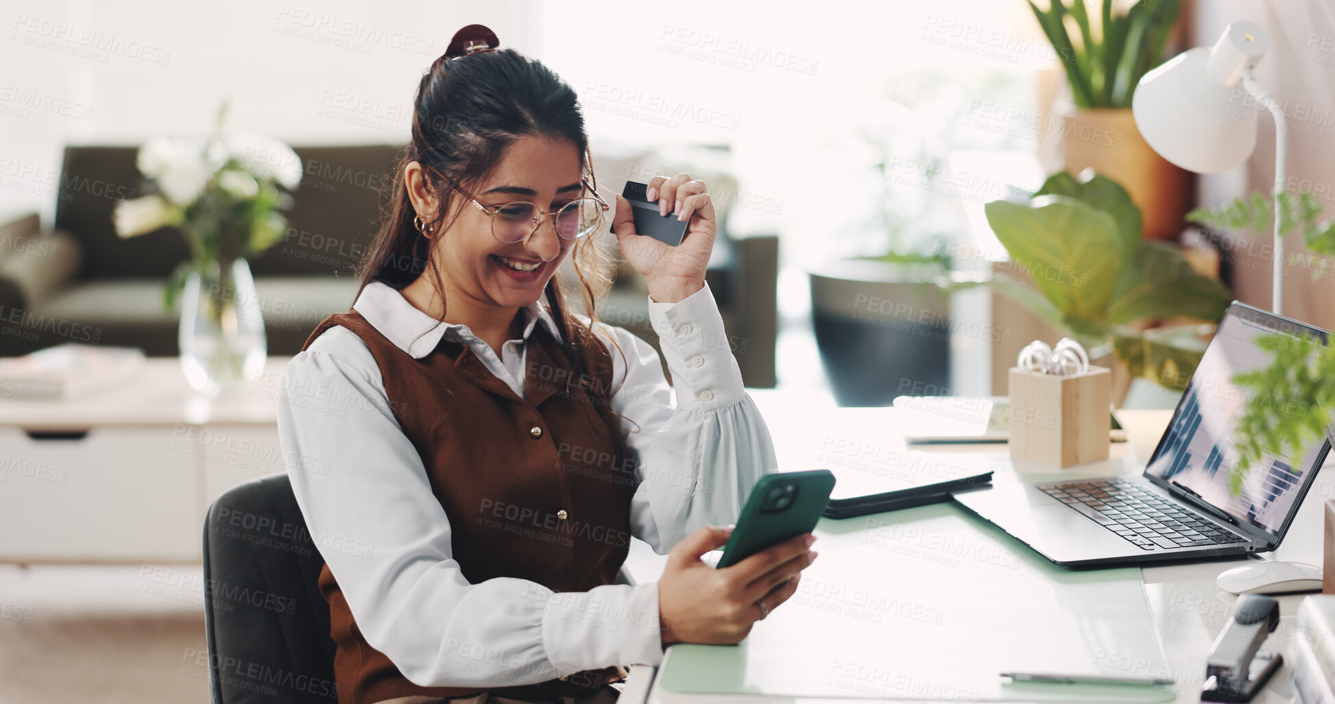 Buy stock photo Credit card, phone and fist pump with business woman in home office for achievement or deal. Success, target and winner with excited remote work employee for celebration, milestone or goals on graphs
