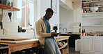 Cellphone, networking and black man in kitchen in home with communication, connectivity or chatting. Happy, technology and African male person with phone for social media on mobile app in apartment.