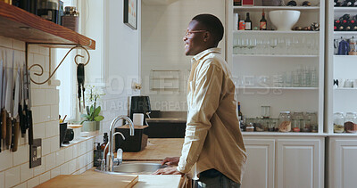 Buy stock photo Smile, black man and thinking by window in kitchen, morning reflection and happy contemplating. Positive attitude, vision and person in home for decision making, ideas and thoughts for day plan.