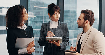 Buy stock photo Meeting, tablet and business people by office window for financial review, discussion and feedback. Corporate, team and workers on tech with finance report for revenue,   proposal and budget planning