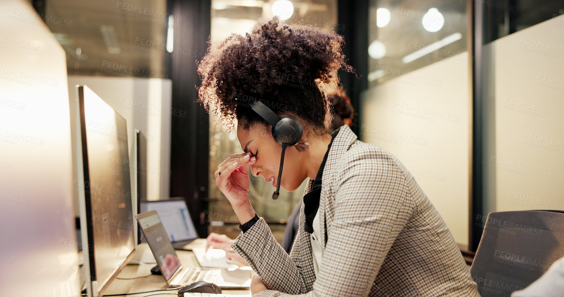 Buy stock photo Stress, headache and call center consultant in office with fatigue, burnout or mistake at night. Headset, tired and technical support agent in overtime with migraine for customer service in workplace