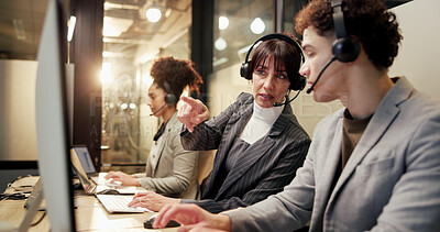 Buy stock photo Monitor, team and people in call centre with pointing, lens flare or assistance at night. Coworking, collaboration and telemarketer at tech for overtime, colleague support or guidance in sales.
