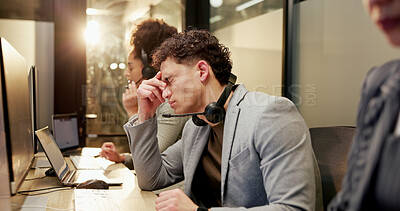 Buy stock photo Man, stress and headache with computer at call centre for customer service, crm and client complaint. Night, person and coworking with migraine, tech support deadline and agent burnout for compliance