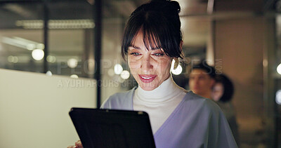 Buy stock photo Happy, employee and woman with tablet in office, working late and journalist with deadline or story. Editor, online and mature person with article at night, proofreading and creative for publication