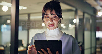 Buy stock photo Creative, employee and woman with tablet in office, working late or proofreading story for deadline. Editor, online and mature person with tech in newsroom, scroll and editing at night for article