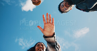Buy stock photo Support, hands together and students or friends outdoor for community, study group and college future. Collaboration, blue sky space and solidarity with low angle of people in university for team