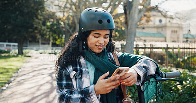 Buy stock photo Notification, communication and woman in park with phone, digital and social media on internet. Happiness, online and African person on bicycle with smile, scrolling and reading for entertainment