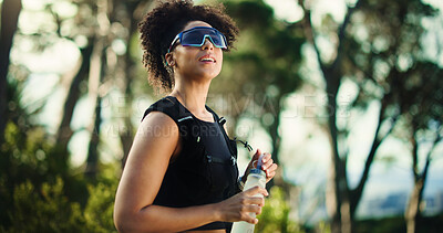 Buy stock photo Break, thinking and water with woman in forest for fitness, hydration or training as runner. Exercise, hiking and planning with athlete person outdoor in nature for challenge, performance or workout