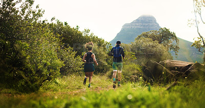 Buy stock photo Back, hiking and running with couple in forest together for challenge, fitness or training. Exercise, wellness and workout with hiker people outdoor in mountains for development, hobby or journey