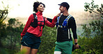 Fitness, stretching or happy couple in mountains for exercise, warm up together or training dedication. Smile, support balance or people in nature for outdoor workout, resilience or health benefits