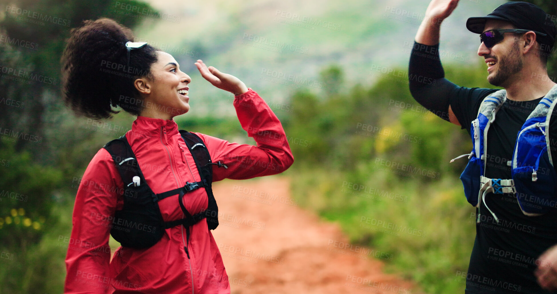 Buy stock photo Fitness, high five and couple in nature with running goal for marathon, race or competition training. Happy, celebration and man with woman for cardio workout achievement together outdoor in forest.