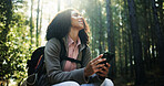 Hiking, thinking and woman with phone in forest for direction search, travel break and map guide. Trekking, hiker and smartphone with space in nature for online navigation, journey reflection or chat