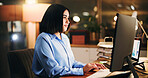 Computer, night and typing with business woman at desk in office for online planning or research. Deadline, internet and search with employee person at work for evening overtime to finish assignment