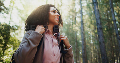 Buy stock photo Happy woman, forest and hiking with backpack for adventure or explore outdoor wilderness. Female person, hiker or smile with bag, sunshine or trees in nature for trekking journey or travel in woods