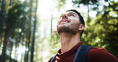 Buy stock photo Thinking, man and hiking with smile in forest for travel, adventure ideas and holiday reflection. Happy, male person and thoughts with trekking vision, backpacking memory and sightseeing in nature