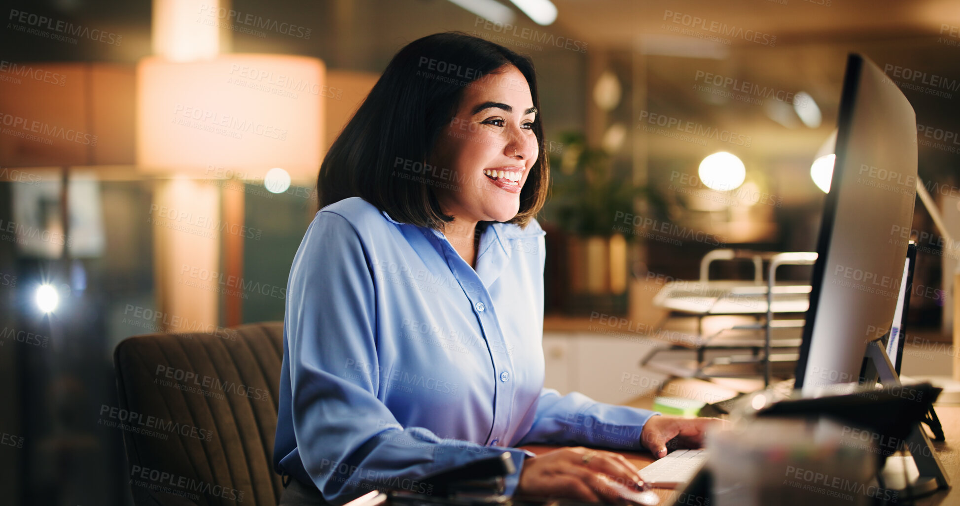 Buy stock photo Office, woman and happy with computer, online or working late for data analysis, excited or success. Night, accountant and person with tech for financial report, reading and achievement for project