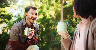 Buy stock photo Couple, hiking and coffee break in forest with conversation, rest or laugh on travel adventure in summer. Happy man, woman and interracial love, tea cup and talk on holiday with trekking in woods