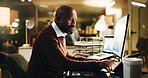 Computer screen, finance and tablet with business black man in office at night for investment. App, display and research with mature portfolio manager at work for evening review of charts or graphs