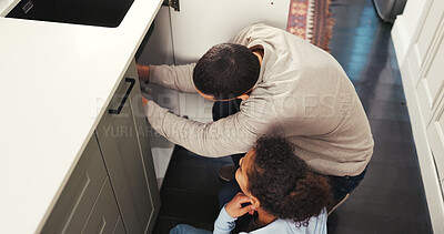 Buy stock photo Plumbing, help and family in house with toolbox, support and maintenance in bonding activity. Observation, father and daughter in kitchen with equipment, teaching and time together for home repair.