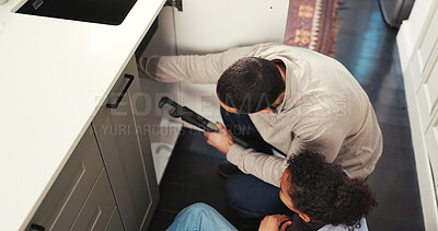 Buy stock photo Kid, help and father with tools at house for plumbing, repair sink and support for maintenance. Above, girl and man with wrench to fix leak, unclogging drain and diy installation for bonding together