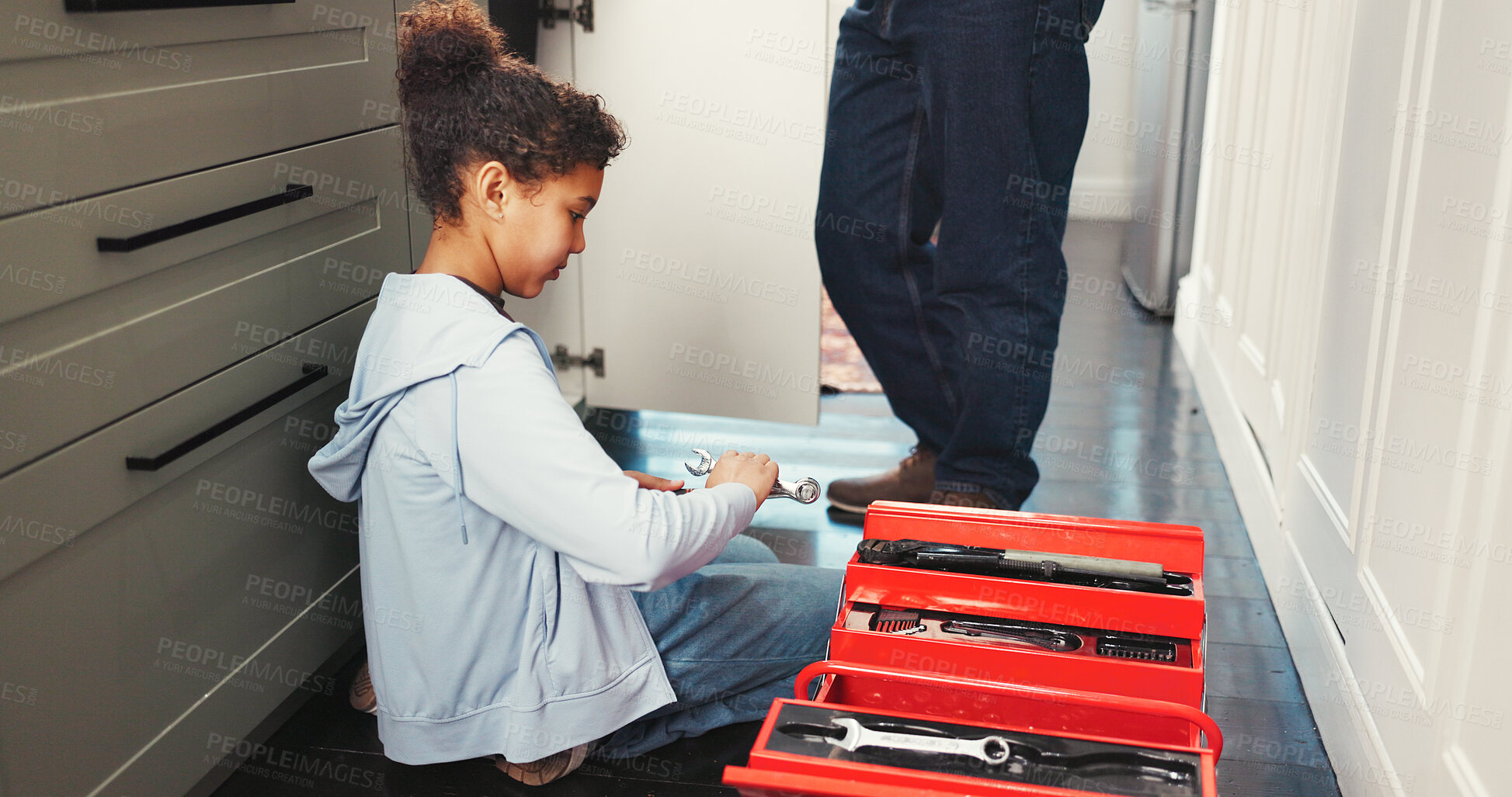 Buy stock photo Box, parent and child in house with tools, repair and maintenance for skills development. Father, daughter or girl helping with hardware equipment, home improvement or renovation for knowledge growth