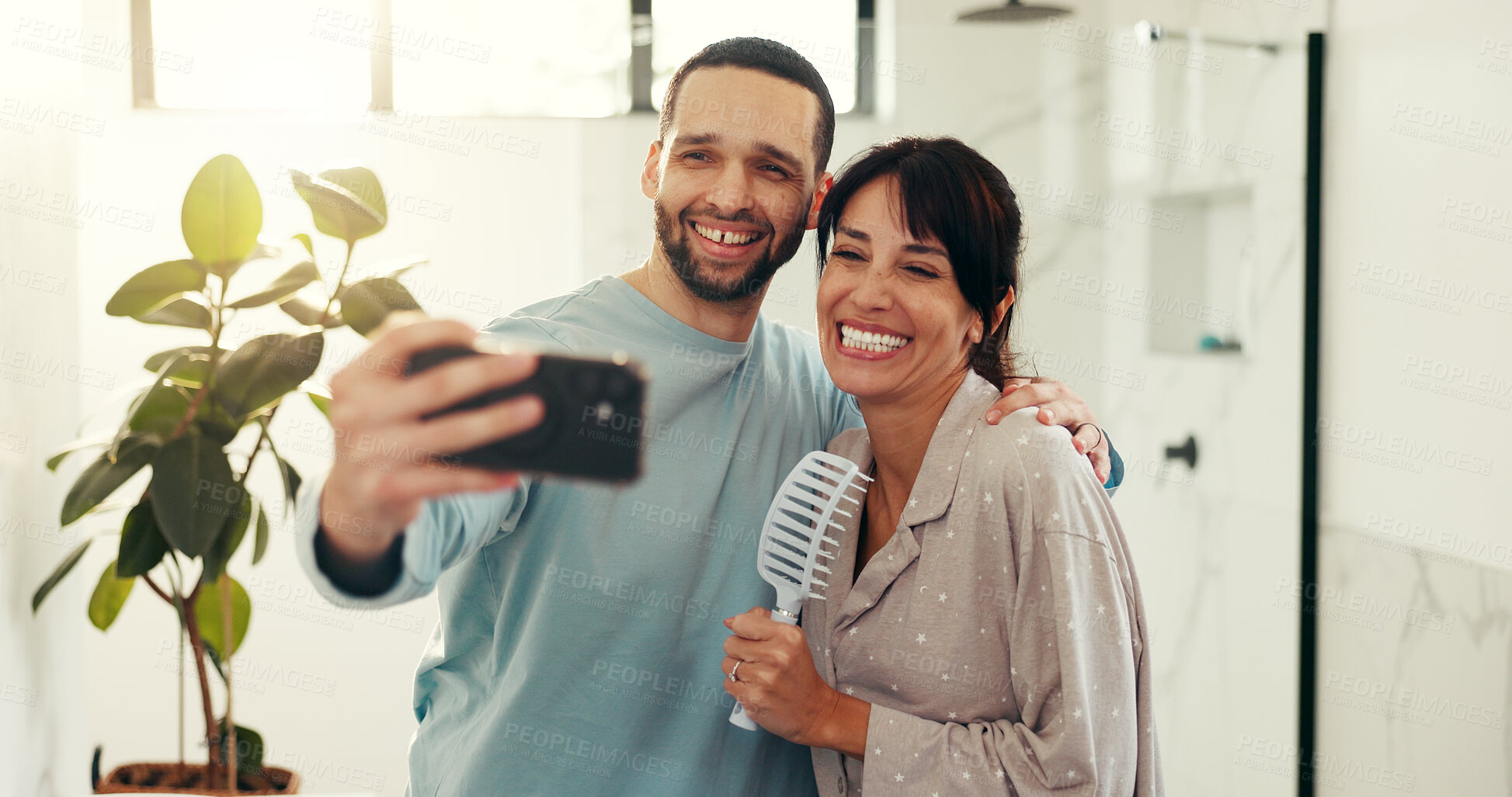 Buy stock photo Happy couple, bathroom and selfie with hug for morning routine, photography or picture in home. Man, woman or smile with capture moment, post or app for grooming, hygiene or memory together in house