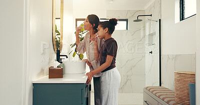 Buy stock photo Child, mother and brushing teeth with mirror in bathroom for fresh breath, oral hygiene and bonding. Family, girl and woman for dental health, cleaning mouth and routine to remove plaque in house
