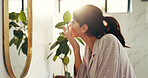 Grooming, skincare and woman in bathroom for beauty routine, daily maintenance and morning hygiene. Wellness, self care and person in home with mirror check, natural style  and getting ready for day